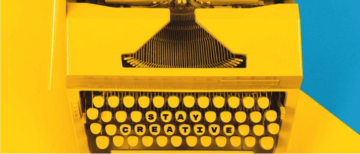 Typewriter with the words 'stay creative' written on the keys