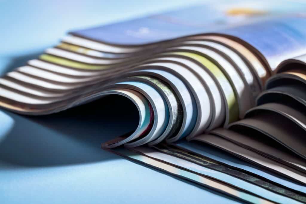 Pages from a leaflet on a table